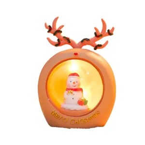 Cute Christmas reindeer night light, glowing snowman desktop ornament for holiday decor.