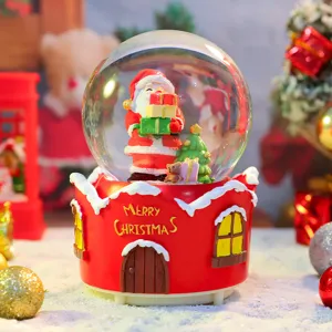 Weihnachten Schneekugel Spieluhr mit LED Licht, Weihnachtsmann Figur und festliche Dekoration.