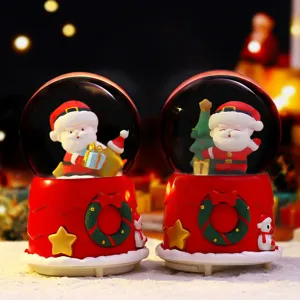 Close-up details of cute Santa snow globe ornament, perfect for Christmas home decor.