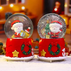 Cute Christmas Santa snow globe ornament, rotating snow crystal ball for festive home decoration.