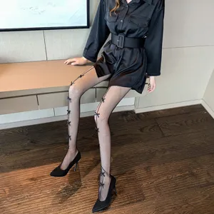 Japanese JK style black fishnet pantyhose with cute bows, sexy sheer thin leg socks for women.
