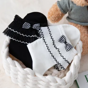 Cute Japanese Lolita socks with plaid bows and ruffles, ideal for autumn winter daily wear.
