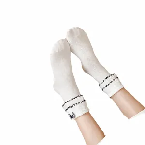 White JK Lolita mid-calf socks with black ruffles and cute bow for sweet daily wear style.