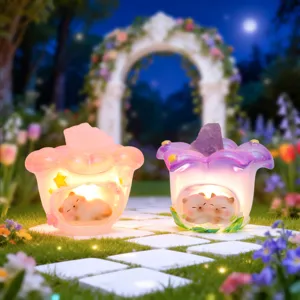 Detailed view of glowing flower crystal night light ornament with cute sleeping animals in magical garden.