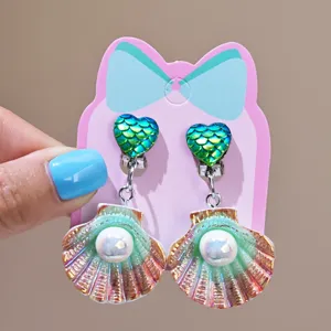 Kids clip-on earrings with heart seashell pearl pendants, perfect for princess dress parties.