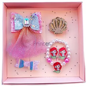 Detailed view of cute kids bow hair clips and mermaid pearl bracelet gift box set details.