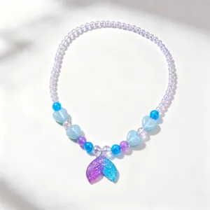 Detailed view of the kids gradient mermaid tail beaded necklace with cute heart beads.