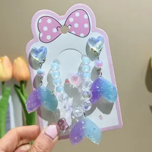 Kids cute mermaid tail jewelry set, featuring clip-on earrings, beaded bracelet, and ring.