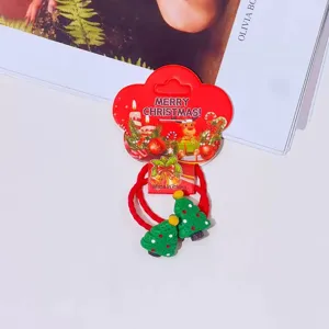 Cute Christmas hair ties for kids, featuring red bands and green tree charms on backing card.