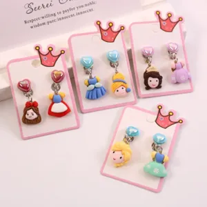 Detailed shot of cute cartoon princess clip-on earrings for little girls, lovely resin designs.