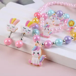 Cute kids cartoon unicorn jewelry set details featuring colorful beads and resin pendants.