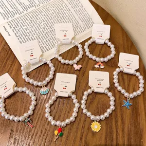 Pearl beaded bracelet with cute alloy charms Korean style sweet sweet jewelry accessory detail