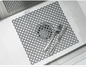 Tapis d'evier de cuisine en silicone gris, tapis de vidange protecteur creux pour la vaisselle.