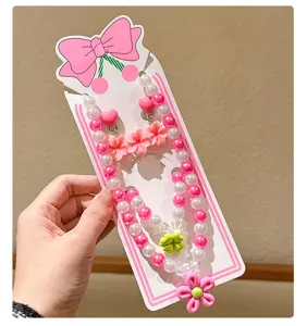 Sweet kids princess pearl necklace set with pink bow card and cute flower charms jewelry.