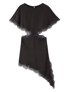 Black dress detail showcasing delicate lace trim, waist cutout and asymmetric hem.
