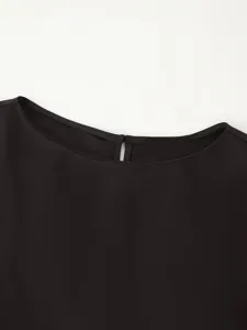 Black women's clothing top detail, elegant round neckline with back cutout design.