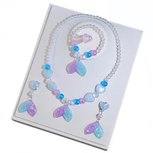 Kids mermaid tail beaded necklace bracelet earrings ring set detail view, magical colorful jewelry.