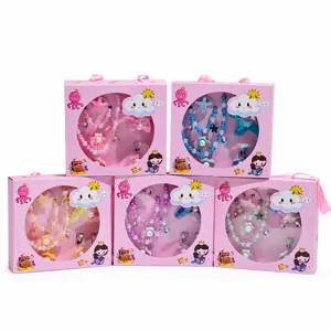 Kids jewelry gift box set with necklaces, bracelets, hair clips and earrings for little girls.