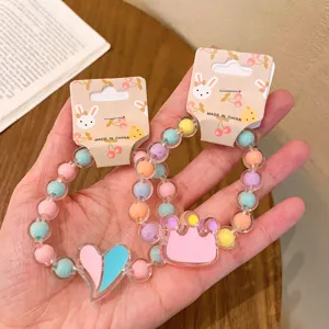 Cute jelly color kids beaded bracelet set with sweet heart and crown pendants for little girls.