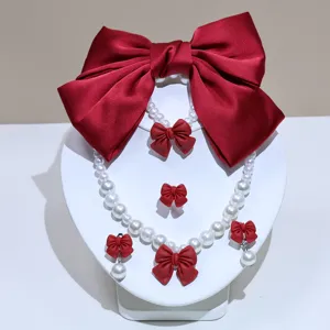 Kids pearl necklace set with red bow hair clip and earrings, sweet girl jewelry gift.