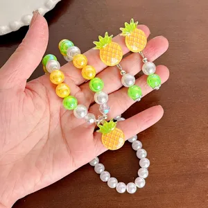 Cute children fruit jewelry set with sweet pineapple pendant, pearl beads necklace and earrings.