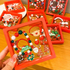 Christmas kids jewelry set featuring cute santa and reindeer design, perfect for party gifts.