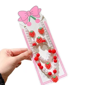 Cute kids jewelry set with pearl necklace and strawberry pendant, sweet princess accessories.