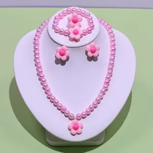 Children's pink pearl necklace bracelet earrings ring set, cute cartoon flower jewelry gift.