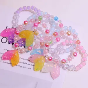Colorful kids beaded bracelets set with cute mermaid tail charms for little girls jewelry.