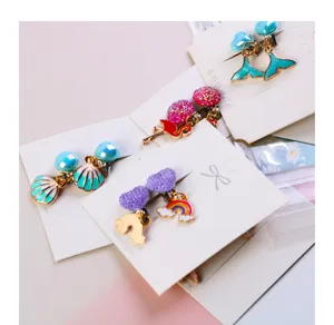 Cute children non-pierced alloy clip-on earrings set featuring mermaid tail and rainbow designs.