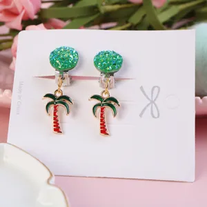 Children's cute clip-on earrings featuring glitter green round tops and tropical palm tree charms.