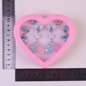 Kids cute clip-on earrings and ring set with adorable mermaid tail design for little girls.