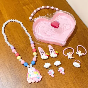 Children's cute unicorn jewelry set with heart storage box, necklace, hair clips and rings.
