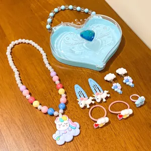 Cute kids jewelry set featuring unicorn necklace, hair clips, earrings, and heart storage box.