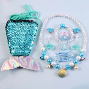 Kids mermaid jewelry set with sequin bag, pearl necklace, bracelet, rings and hair clips.