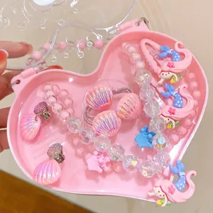 Cute kids pink heart jewelry box set with shell earrings necklace and hair clips detail view