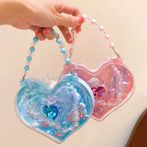 Clear heart-shaped jewelry storage box toy with beaded handle for kids and little girls