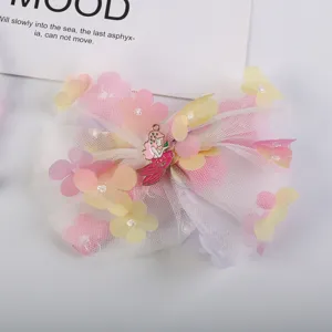 Children mesh floral hair bow with cute mermaid charm, sweet pink princess hair accessory.