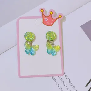 Children butterfly clip-on earrings detail view, sweet cute non-pierced jewelry for kids daily wear.