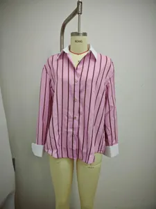 Pink striped long sleeve shirt detail with contrasting white lapel and cuffs for women.