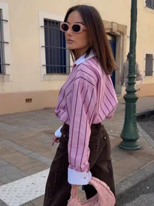 Casual loose long sleeve striped lapel shirt for women, stylish streetwear fashion top.