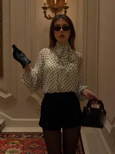 French vintage polka dot long sleeve blouse with bow tie collar for women stylish daily wear.