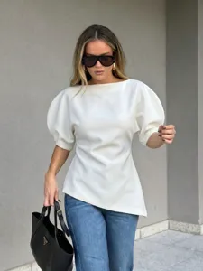 Chic white puff sleeve blouse for women, slim fit round neck top for stylish casual wear.