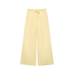 Light yellow wide-leg trousers detail, casual drawstring waist design, comfortable fabric.