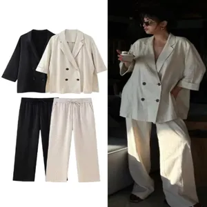 Mujer primavera estilo calle efecto arruga blazer cruzado y pantalón conjunto detalle
