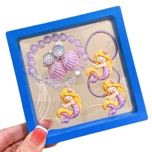 Cute mermaid theme kids jewelry set featuring hair ties, bracelet and rings for girls.