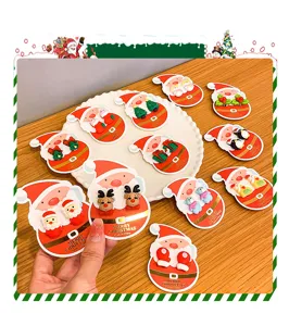 Christmas cartoon children clip earrings detail view, cute resin holiday jewelry display.