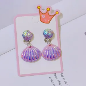 Detailed view of cute children clip-on earrings with purple iridescent seashell pendants.