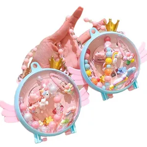 Children jewelry gift box set with cute unicorn rainbow hair clips and colorful bead bracelets.