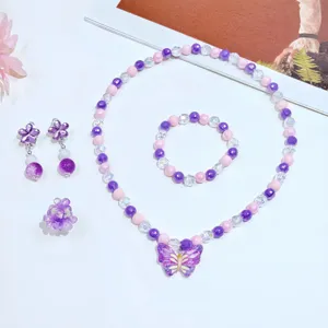 Kids purple butterfly beaded necklace bracelet earrings ring jewelry 5-piece set detail view.
